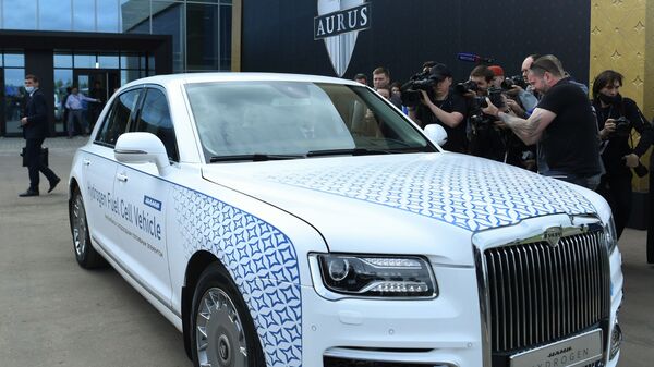 بدء الإنتاج التسلسلي لسيارات أوروس سينات في مصنع ألاباغا بجمهورية تتارستان، روسيا 31 مايو 2021 - سبوتنيك عربي