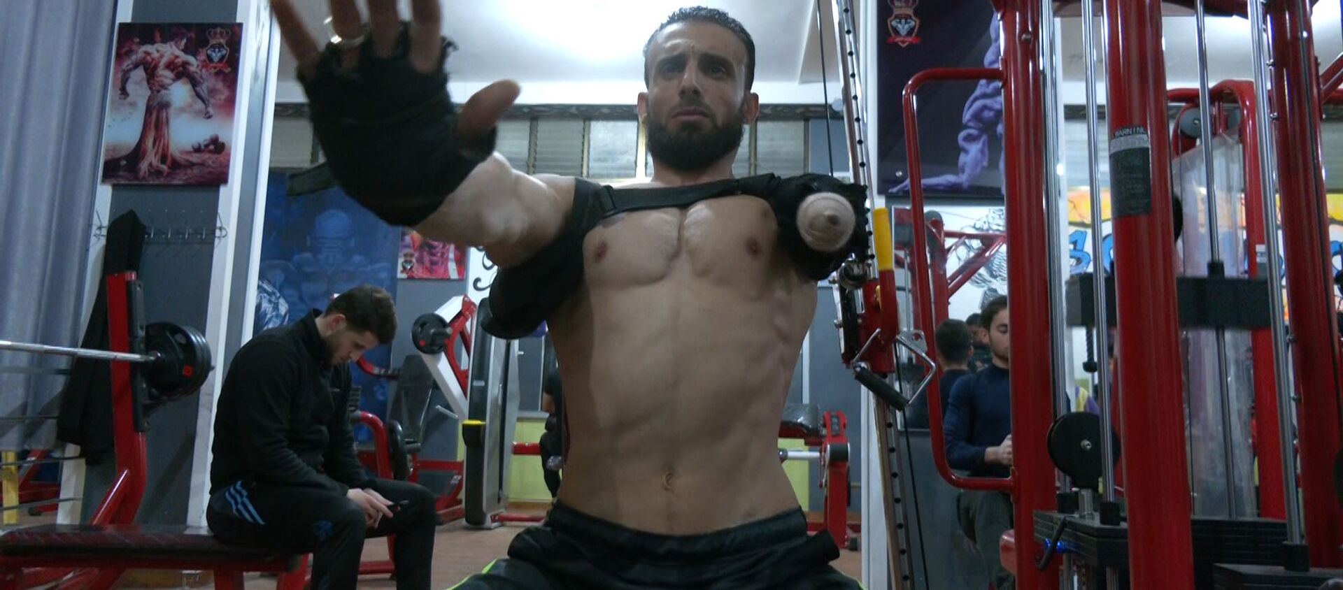 نضال الداعور من مدينة غزة يتحدى الإعاقة برياضة كمال الأجسام، قطاع غزة، فلسطين 12 يوليو 2021 - سبوتنيك عربي, 1920, 12.07.2021