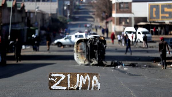  قوات الدفاع الوطني تنتشر في شوارع جوهانسبرغ بعد انتشار أعمال العنف في أعقاب تنفيذ الحكم بالسجن على الرئيس السابق جاكوب زوما، جنوب أفريقيا، 11 يوليو 2021 - سبوتنيك عربي