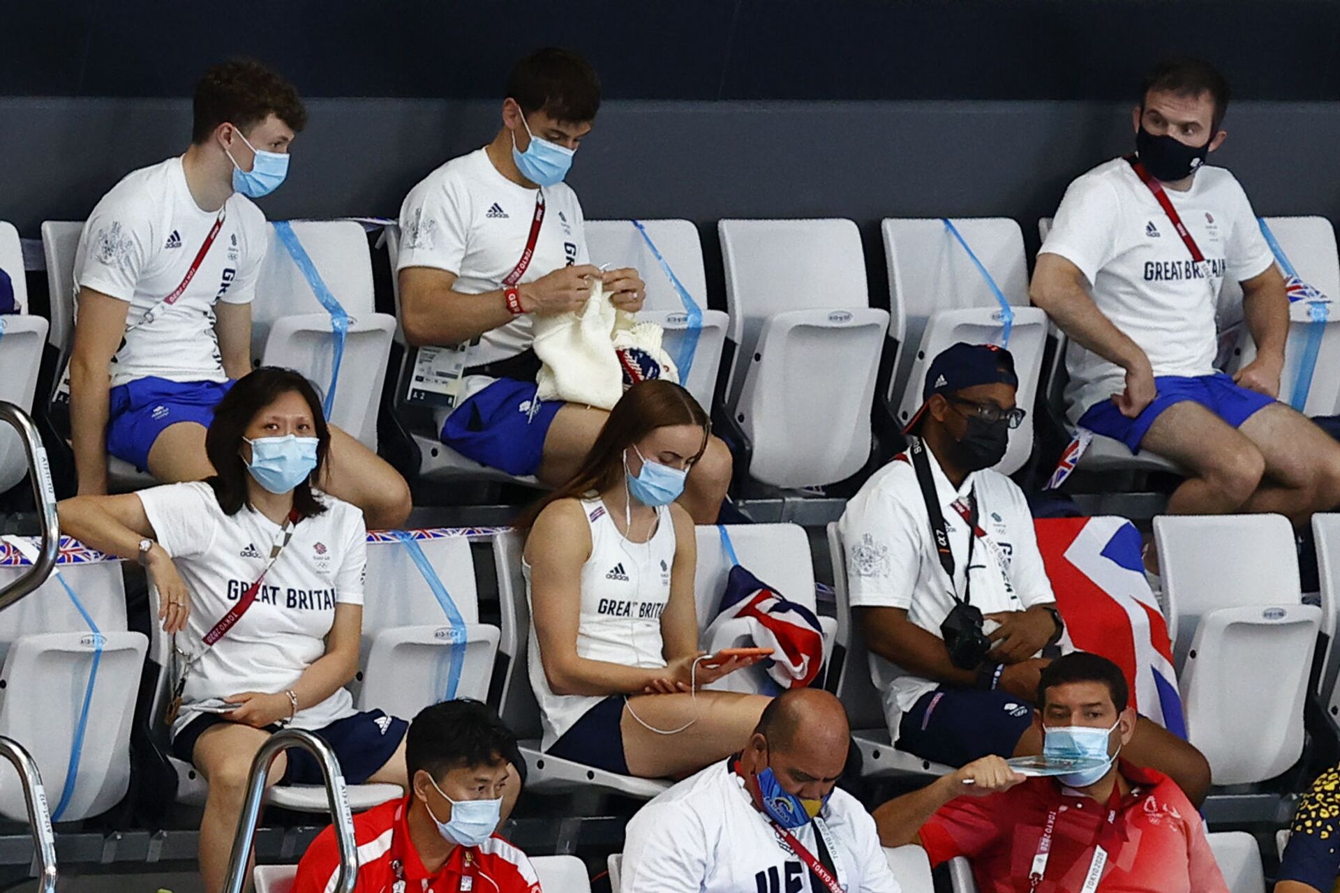 بطل أولمبي مشغول بحياكة الصوف خلال أشد منافسات أولمبياد طوكيو... صور وفيديو - سبوتنيك عربي, 1920, 02.08.2021