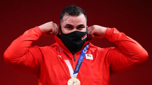 الرباع السوري صاحب برونزية رفع الأثقال في أولمبياد طوكيو ، معن أسعد - سبوتنيك عربي