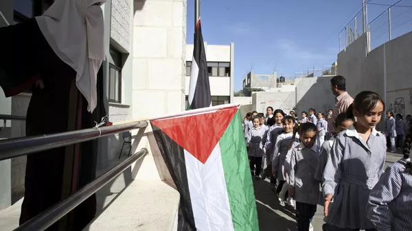 تلاميذ إحدى مدارس الأونروا في مدينة نابلس، الضفة الغربية، فلسطين 1 يونيو 2010 - سبوتنيك عربي