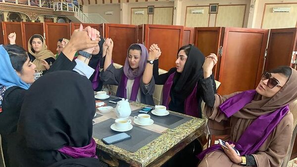 نساء أفغانيات يطالبن بحقوقهن في ظل حكم حركة طالبان بعد السيطرة على كابول، أفغانستان، 4 سبتمبر/ أيلول 2021 - سبوتنيك عربي