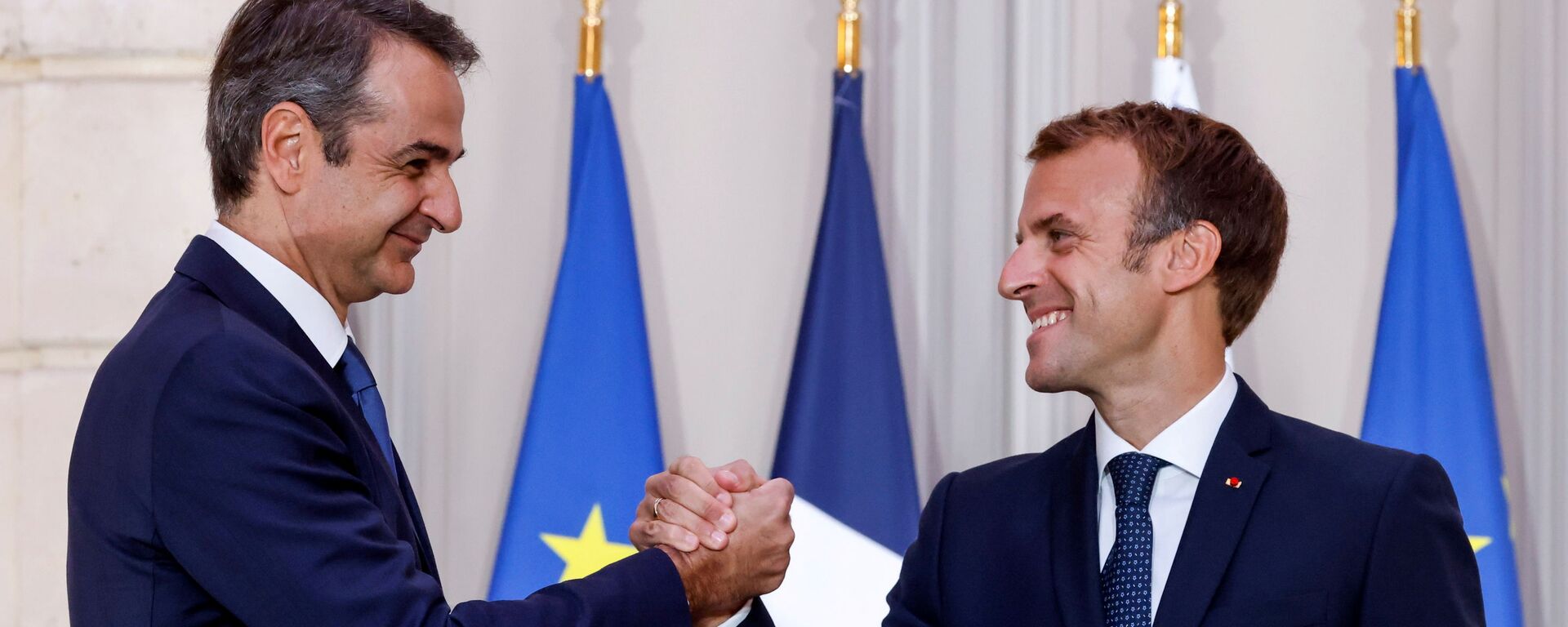 الرئيس الفرنسي إيمانويل ماكرون ورئيس الحكومة اليونانية كيرياكوس ميتسوتاكيس خلال مؤتمر صحفي مشترك في باريس، فرنسا 28 سبتمبر 2021 - سبوتنيك عربي, 1920, 28.09.2021