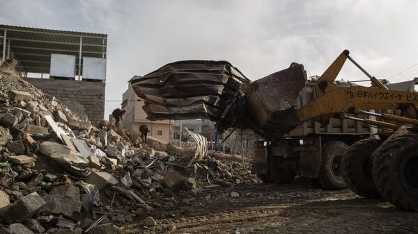 ترميم المنازل من دمار الحرب التي تسببها داعش في الموصل العراق - سبوتنيك عربي