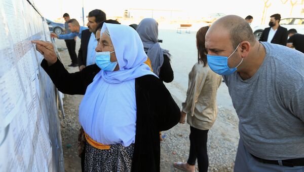 اليزيديون يشاركون في الانتخابات العراقية في دهوك، العراق 8 أكتوبر 2021 - سبوتنيك عربي