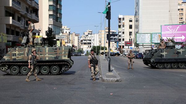 قوات الجيش اللبناني تنتشر في حي الطيونة، بيروت، لبنان 14 أكتوبر 2021 - سبوتنيك عربي