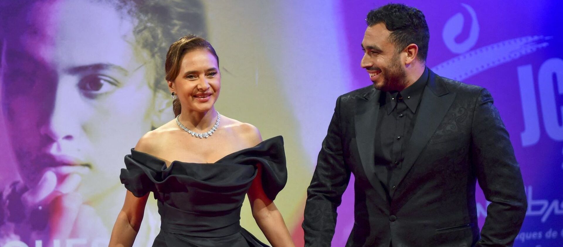 الفنانة المصرية، نيللي كريم، مع زوجها هشام عاشور في مهرجان أيام قرطاج السينمائية 2021، تونس - سبوتنيك عربي, 1920, 08.11.2021