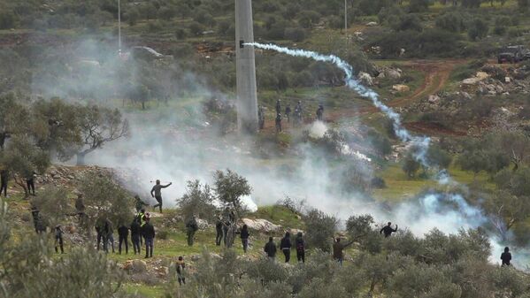 عشرات الإصابات برصاص الجيش الإسرائيلي في مواجهات بالضفة الغربية، بيتا، فلسطين 4 مارس 2022
 - سبوتنيك عربي