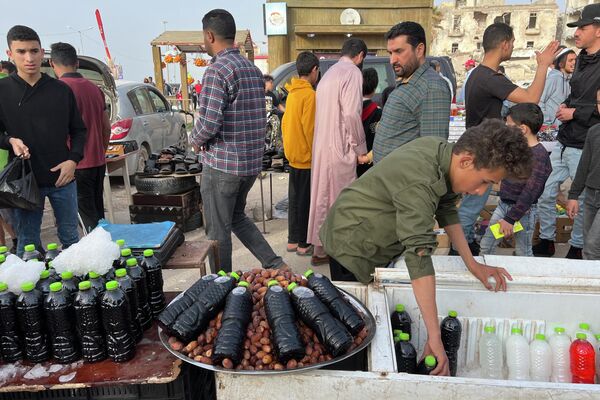 عودة الأسواق الشعبية الرمضانية في بنغازي وسط الدمار - سبوتنيك عربي