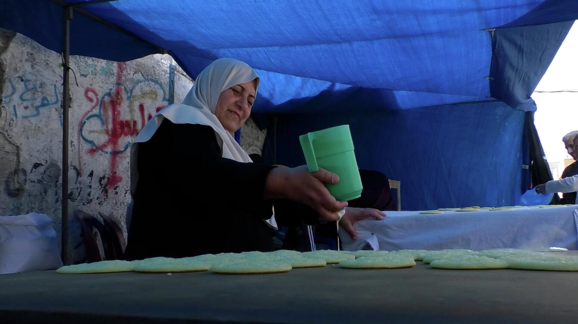 مريم صالحة، غزية بائعة قطايف في شهر رمضان - سبوتنيك عربي, 1920, 28.04.2022