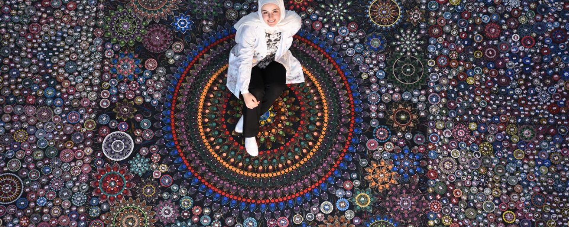 لمى زكريا، فتاة سورية تدخل غينيس عن أكبر عرض ماندالا في العالم - سبوتنيك عربي, 1920, 13.05.2022
