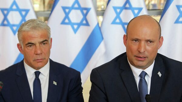 رئيس الحكومة الإسرائيلية نفتالي بينيت مع وزير الخارجية الإسرائيلي يائير لابيد - سبوتنيك عربي