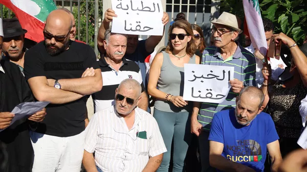 مسيرة بعنوان لن ندفع الثمن تجوب بيروت احتجاجا على تردي الأوضاع المعيشية - سبوتنيك عربي
