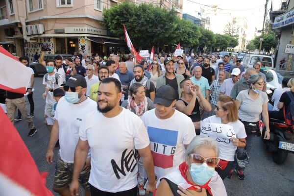 مسيرة بعنوان لن ندفع الثمن تجوب بيروت احتجاجا على تردي الأوضاع المعيشية - سبوتنيك عربي