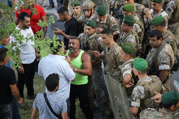 مسيرة بعنوان لن ندفع الثمن تجوب بيروت احتجاجا على تردي الأوضاع المعيشية - سبوتنيك عربي