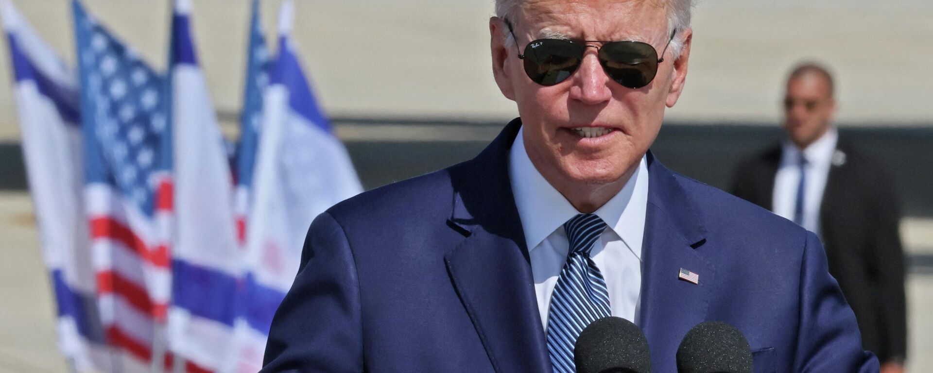 الرئيس الأمريكي جو بادين يلقي كلمة أمام الصحفيين في مطار بن غوريون في إسرائيل، 13 يوليو 2022 - سبوتنيك عربي, 1920, 07.07.2023