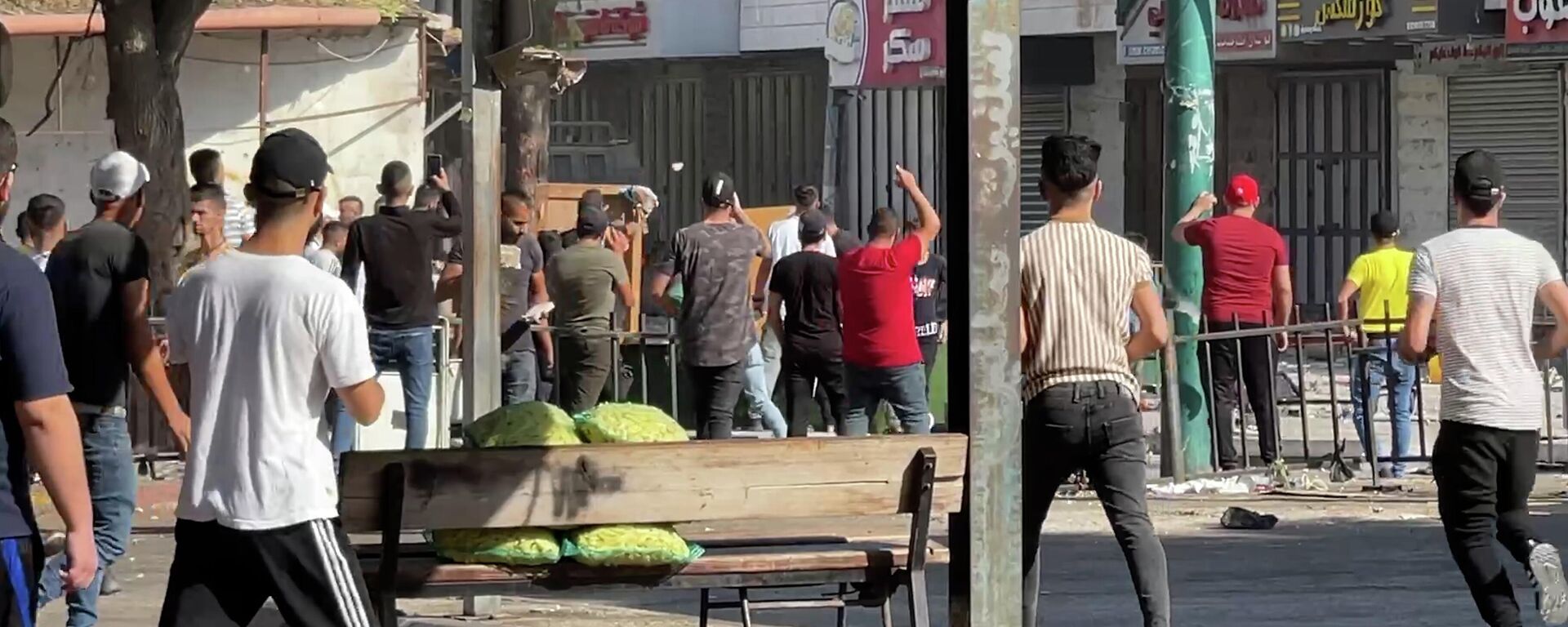 عشرات آلاف من الفلسطينيين يشيعون قائد في كتائب شهداء الأقصى قضى في عملية إسرائيلية في نابلس - سبوتنيك عربي, 1920, 20.09.2022