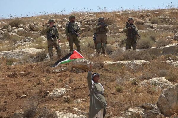 عشرات الإصابات خلال قمع الجيش الإسرائيلي مسيرات ضد الاستيطان في الضفة الغربية - سبوتنيك عربي