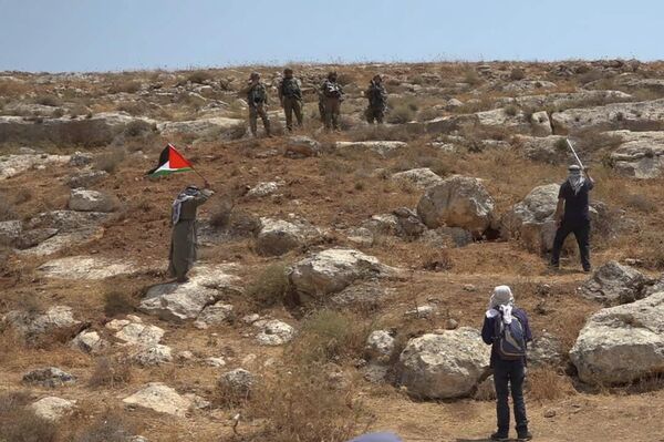 عشرات الإصابات خلال قمع الجيش الإسرائيلي مسيرات ضد الاستيطان في الضفة الغربية - سبوتنيك عربي