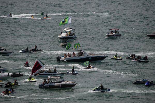 أنصار الرئيس البرازيلي جايير بولسونارو يشارك في الاحتفالات بمناسبة الذكرى المئوية الثانية لاستقلال البرازيل، في شارع باوليستا ، في ساو باولو، البرازيل، في 7 سبتمبر 2022. - سبوتنيك عربي