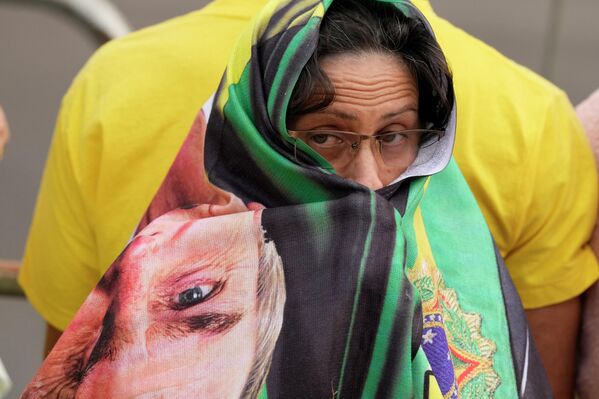 أنصار الرئيس البرازيلي جايير بولسونارو يشارك في الاحتفالات بمناسبة الذكرى المئوية الثانية لاستقلال البرازيل، في شارع باوليستا ، في ساو باولو، البرازيل، في 7 سبتمبر 2022. - سبوتنيك عربي