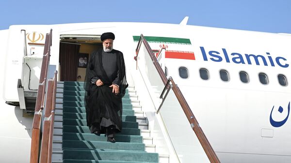 وصول الرئيس الإيراني إبراهيم رئيسي إلى سمرقند في إطار مؤتمر منظمة شنغهاي للتعاون، أوزبكستان 14سبتمبر 2022 - سبوتنيك عربي