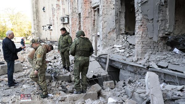 أثار قصف القوات المسلحة الأوكرانية في دونيتسك - سبوتنيك عربي