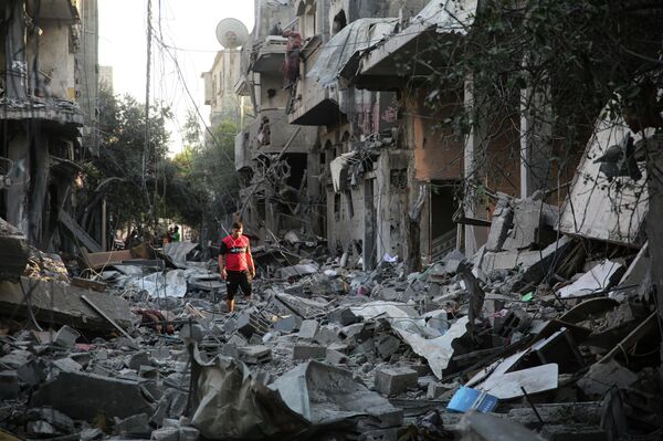 آثار قصف سلاح الجو الإسرائيلي على قطاع غزة، فلسطين، مايو 2021 - سبوتنيك عربي