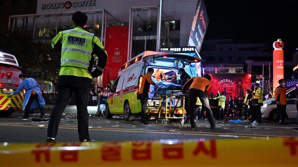 حادث التدافع في منطقة إيتايون بالعاصمة سيئول، كوريا الجنوبية - سبوتنيك عربي