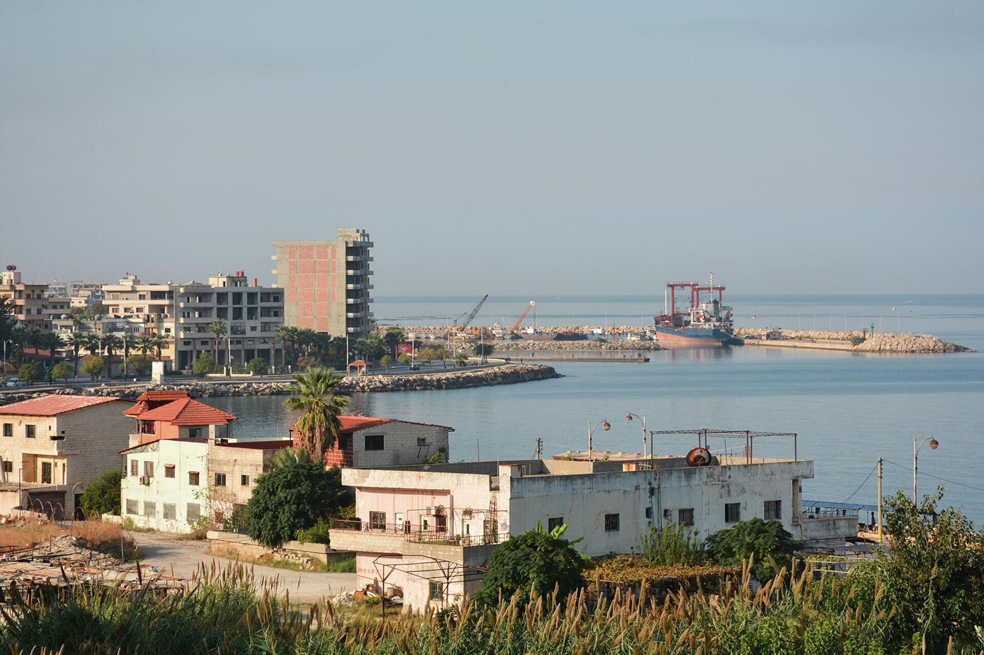 سفّان سوري يواجه الحصار ويستقطب أول سفينة أجنبية إلى (حوضه) في بانياس سفّان سوري يواجه الحصار ويستقطب أول سفينة أجنبية إلى (حوضه) في بانياس - سبوتنيك عربي, 1920, 02.11.2022