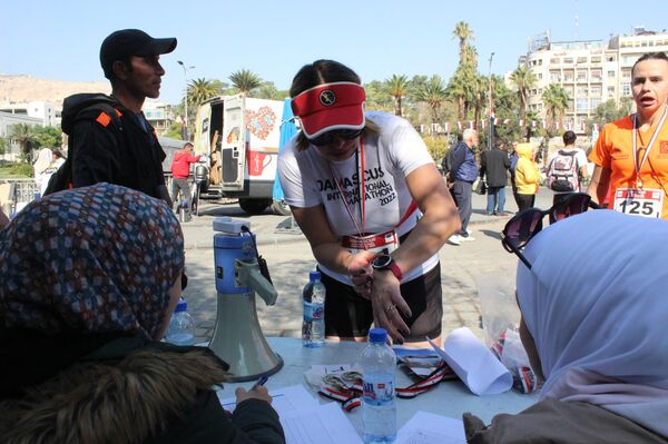 فعاليات سباقات ماراثون دمشق لمسافة (42.195) كم في العاصمة السورية دمشق، بمشاركة عدائين أجانب - سبوتنيك عربي