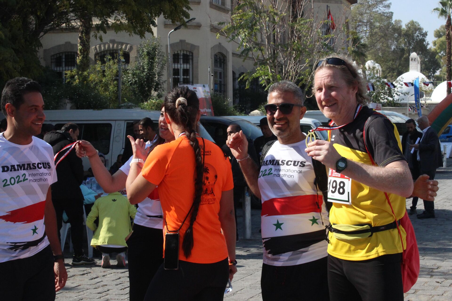 فعاليات سباقات ماراتون دمشق لمسافة (42.195) كم في العاصمة السورية دمشق، بمشاركة عدائين أجانب - سبوتنيك عربي, 1920, 11.11.2022