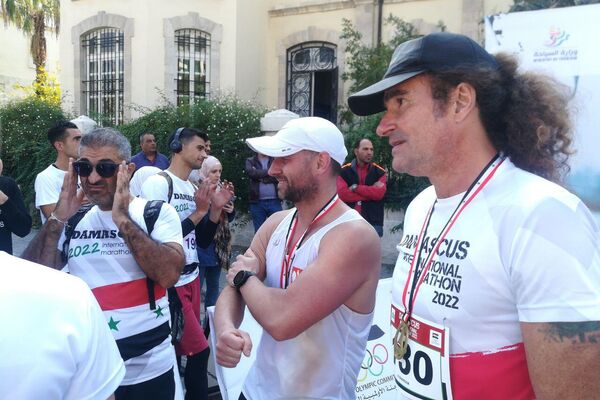 فعاليات سباقات ماراثون دمشق لمسافة (42.195) كم في العاصمة السورية دمشق، بمشاركة عدائين أجانب - سبوتنيك عربي
