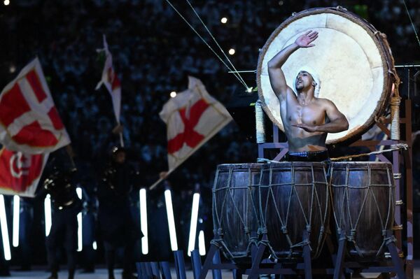 راقصون يؤدون عرضهم خلال حفل الافتتاح قبيل انطلاق مباراة المجموعة الأولى لكأس العالم 2022 في قطر بين قطر والإكوادور على ملعب البيت في الخور شمال الدوحة في 20 نوفمبر 2022. راقصون يؤدون عرضهم خلال حفل الافتتاح قبيل انطلاق مباراة المجموعة الأولى لكأس العالم 2022 في قطر بين قطر والإكوادور على ملعب البيت في الخور شمال الدوحة في 20 نوفمبر 2022. - سبوتنيك عربي