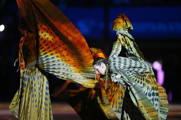 راقصون يؤدون عرضهم خلال حفل الافتتاح قبيل انطلاق مباراة المجموعة الأولى لكأس العالم 2022 في قطر بين قطر والإكوادور على ملعب البيت في الخور شمال الدوحة في 20 نوفمبر 2022. راقصون يؤدون عرضهم خلال حفل الافتتاح قبيل انطلاق مباراة المجموعة الأولى لكأس العالم 2022 في قطر بين قطر والإكوادور على ملعب البيت في الخور شمال الدوحة في 20 نوفمبر 2022. - سبوتنيك عربي