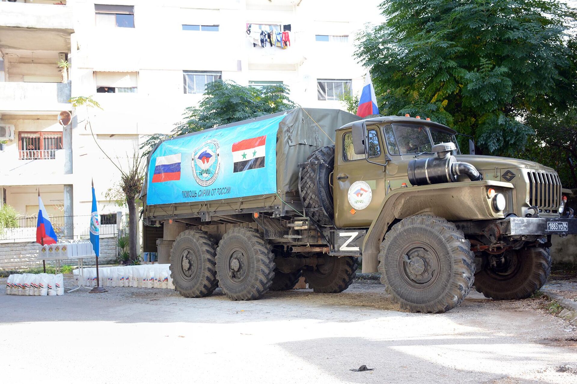 الجيش الروسي يوزّع مساعدات 3 أطنان من المساعدات الإنسانية في اللاذقية السورية - سبوتنيك عربي, 1920, 28.11.2022