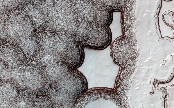 منظر للسطح المغطى بالجليد للقطب الجنوبي لكوكب المريخ - سبوتنيك عربي