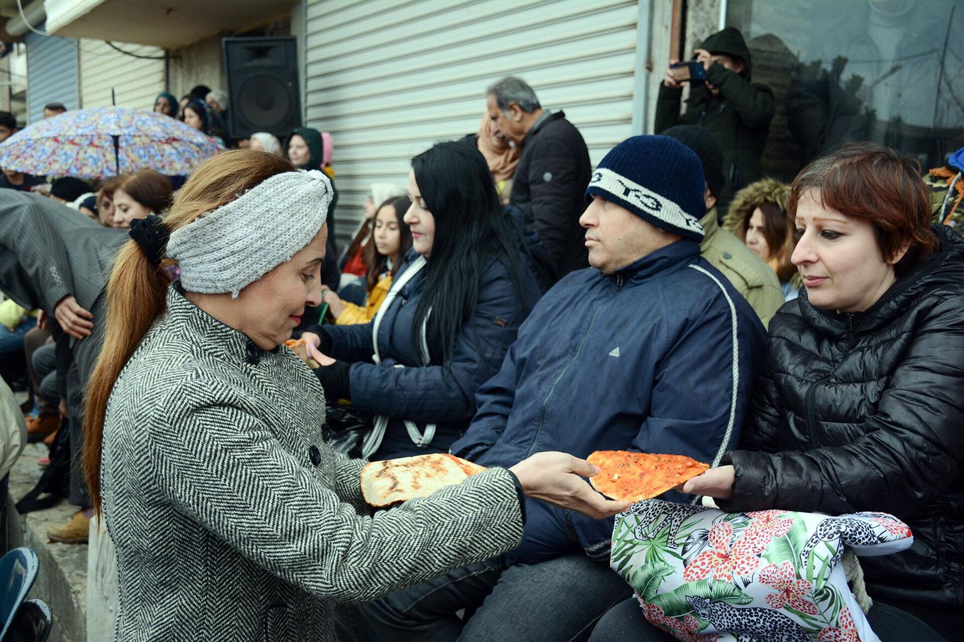 عيد القوزلة.. سكان الساحل السوري يحتفلون برأس السنة الشرقية - سبوتنيك عربي, 1920, 16.01.2023