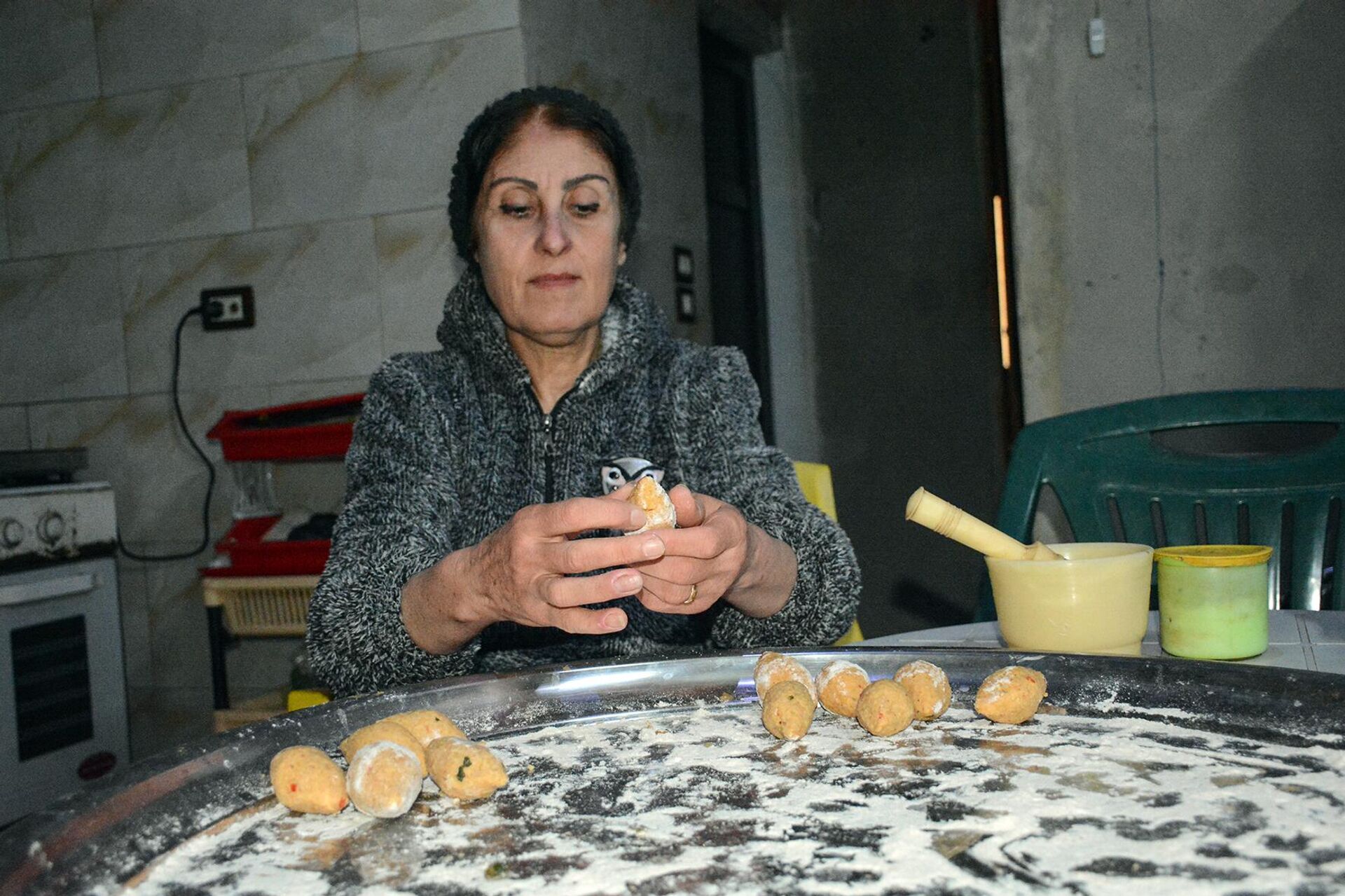 عيد القوزلة.. سكان الساحل السوري يحتفلون برأس السنة الشرقية - سبوتنيك عربي, 1920, 16.01.2023