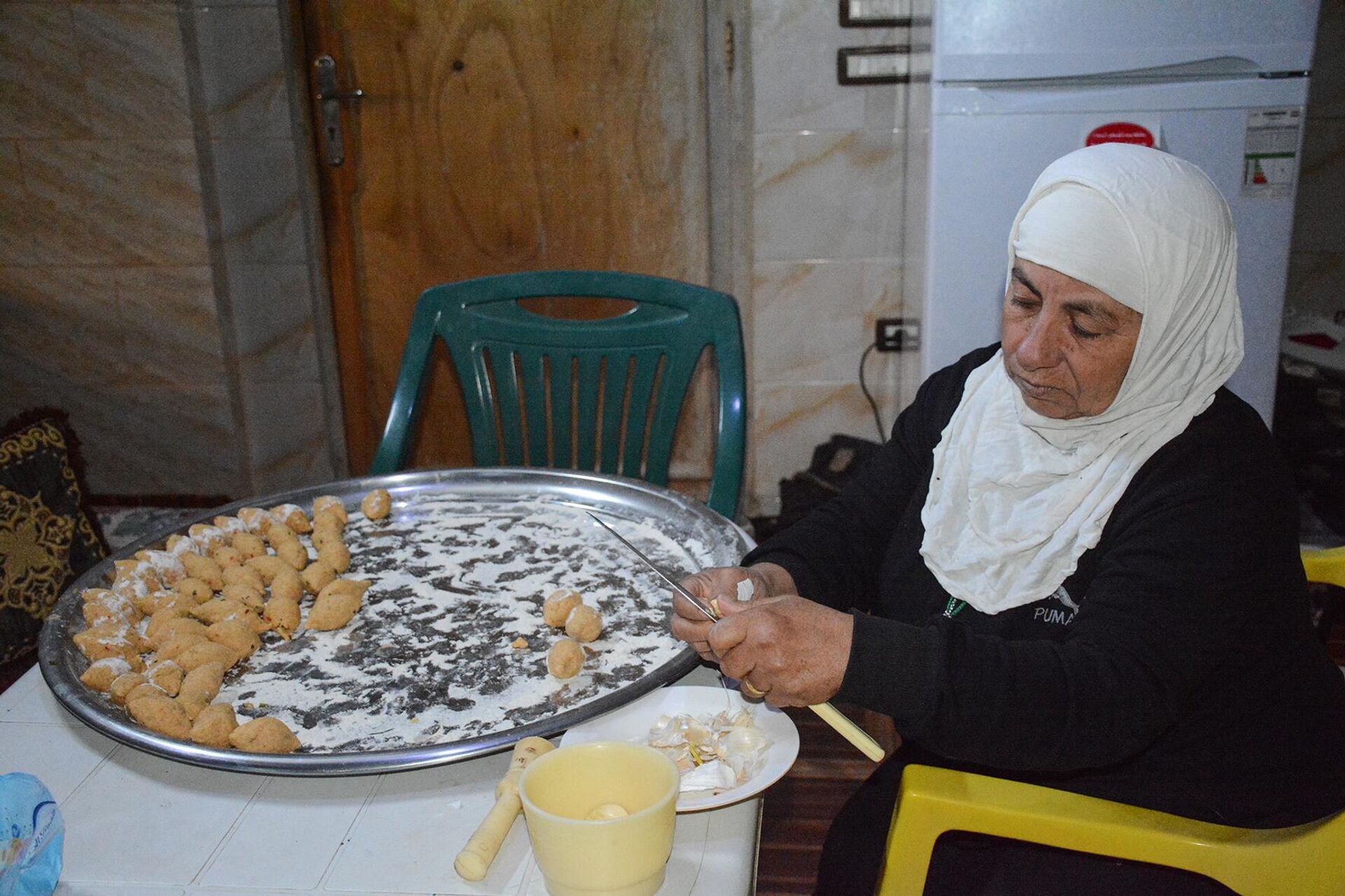 عيد القوزلة.. سكان الساحل السوري يحتفلون برأس السنة الشرقية - سبوتنيك عربي, 1920, 16.01.2023