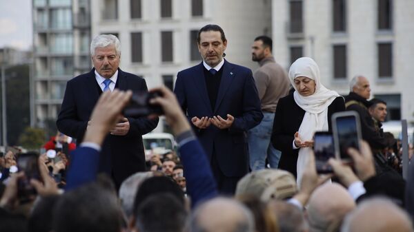 حشود شعبية وسياسية تحيي الذكرى 18 لاغتيال رئيس وزراء لبنان الأسبق رفيق الحريري - سبوتنيك عربي