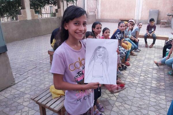 فتاة مصرية تؤسس مكتبة في قريتها الصغيرة بالمنوفية - سبوتنيك عربي