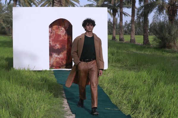 عرض أزياء في بستان في الحسينية، شمال بغداد في 7 مارس 2023. - سبوتنيك عربي