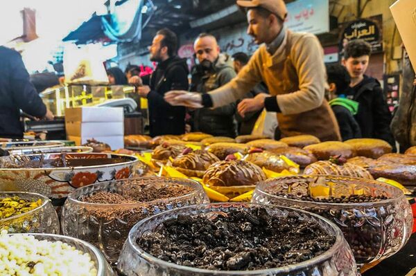 الجزماتية... أشهر أسواق الأطعمة الرمضانية في دمشق القديمة - سبوتنيك عربي