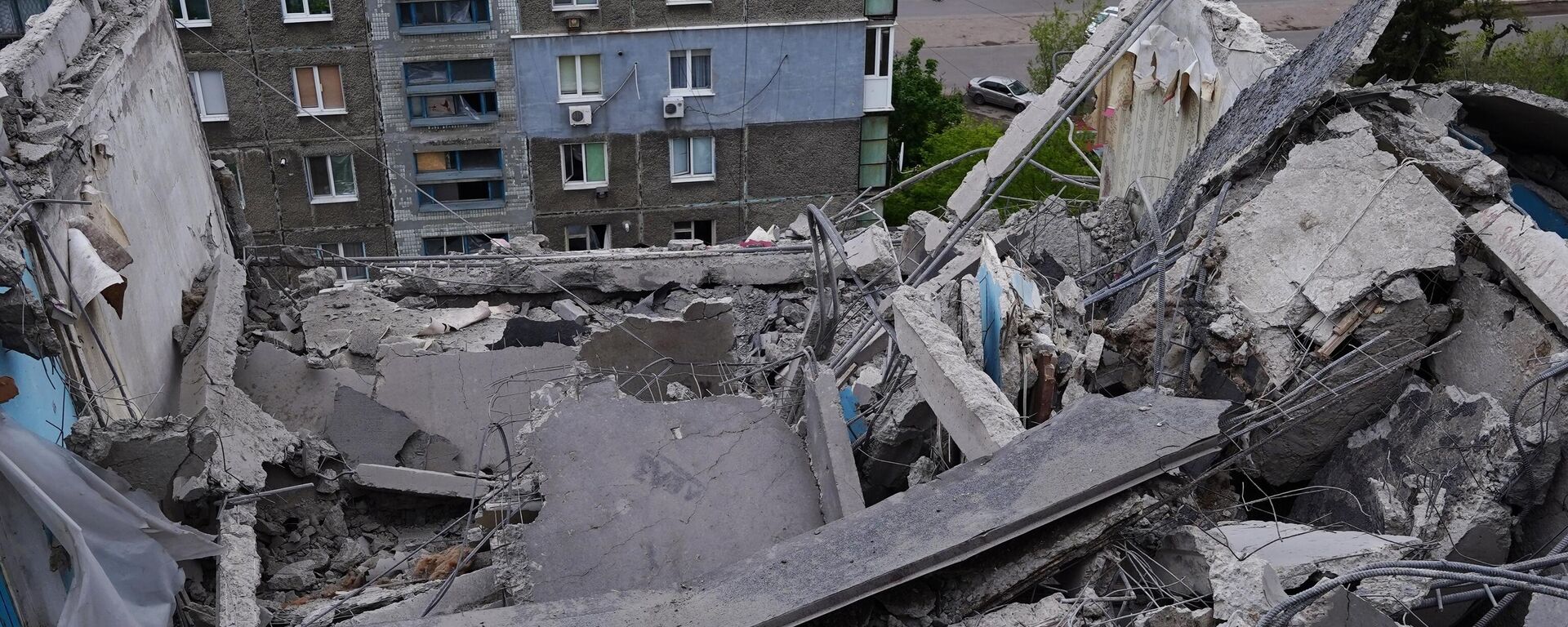 تداعيات قصف القوات المسلحة الأوكرانية بواسطة هيمارس في ستاخانوف، جمهورية لوغانسك الشعبية - سبوتنيك عربي, 1920, 12.05.2023