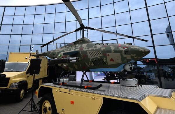 مروحية استطلاع هجومية دون طيار"هنتر"  بيلاروسية الصنع في المعرض الدولي الحادي عشر للأسلحة والمعدات العسكرية "MILEX-2023" في مينسك، بيلاروسيا. - سبوتنيك عربي