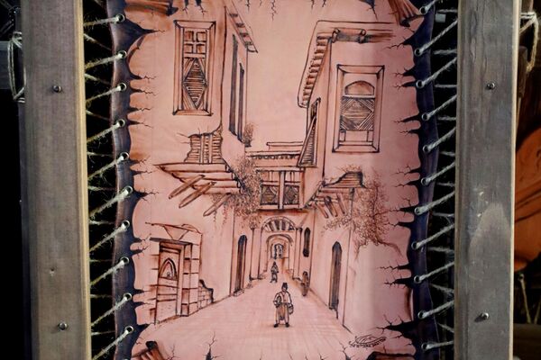 الرسم على الجلد... أحد أقدم الفنون يتنفس جمالا في شوارع دمشق - سبوتنيك عربي