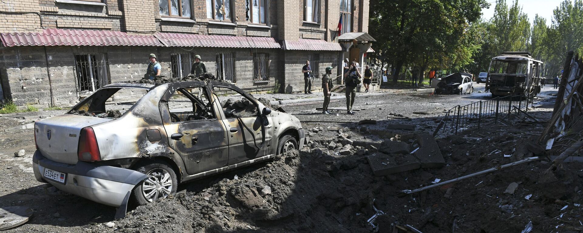 عواقب قصف القوات المسلحة الأوكرانية على دونيتسك، جمهورية دونيتسك الشعبية - سبوتنيك عربي, 1920, 21.01.2024