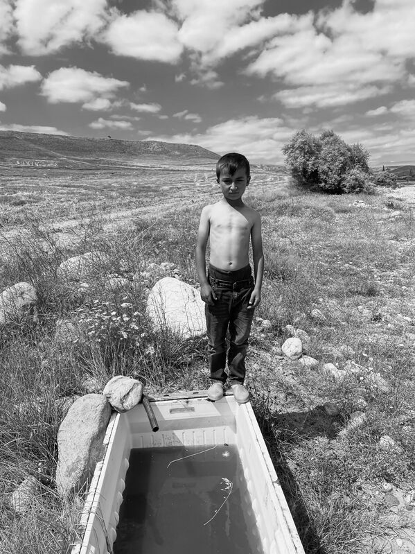 صورة بعنوان "القطرة الأخيرة" في تركيا، للمصور التركي رمضان شيراكوغلو (بواسطة iPhone 12)، الفائز بالمركز الأول في فئة "بورتريه" في مسابقة جوائز آيفون للتصوير لعام 2023 - سبوتنيك عربي